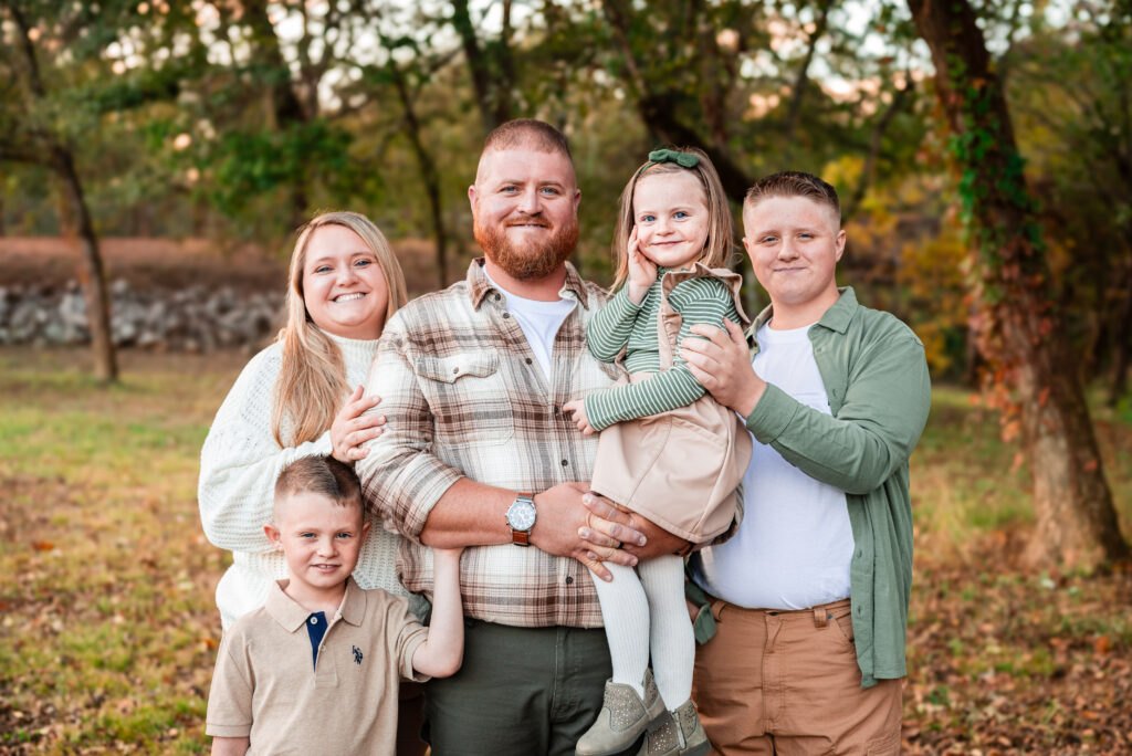 Family of five posing for family pictures at Hayes Nature Preserve in Huntsville Alabama